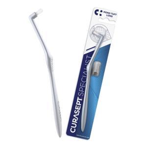 Spazzolino monociuffo curasept per igiene orale specializzata, ideale per impianti e denti isolati, setole morbide e flessibili